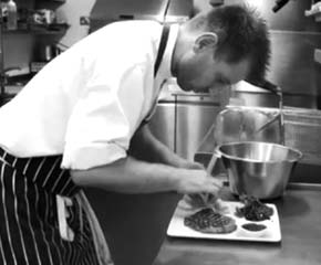 Chef cooking in professional kitchen