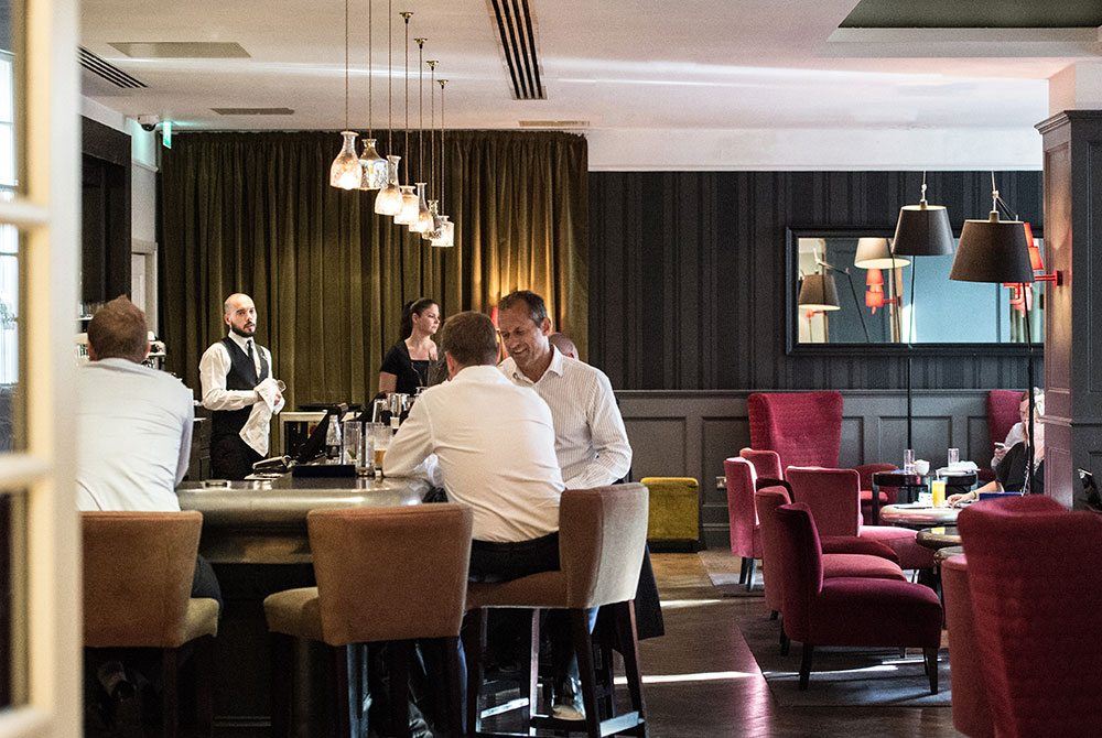 Chatting amid the relaxed atmosphere of the hotel bar
